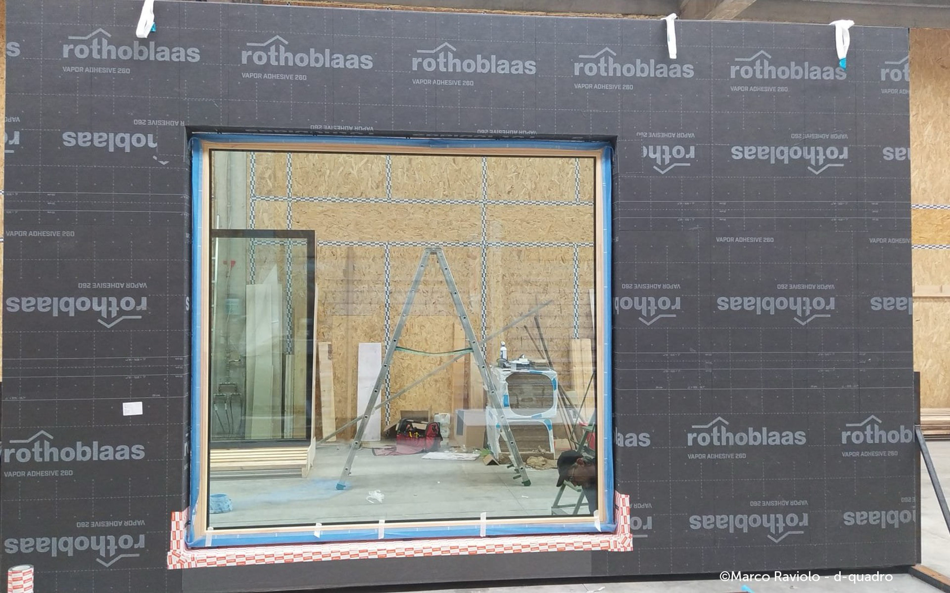 Prefabricated timber facade with Rothoblaas membrane installed in factory for airtight building envelope retrofit